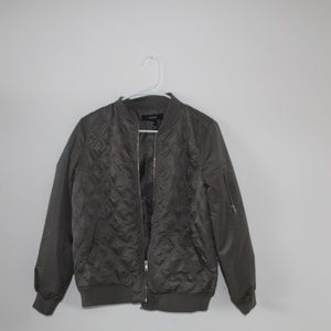 silvery-green bomber jacket